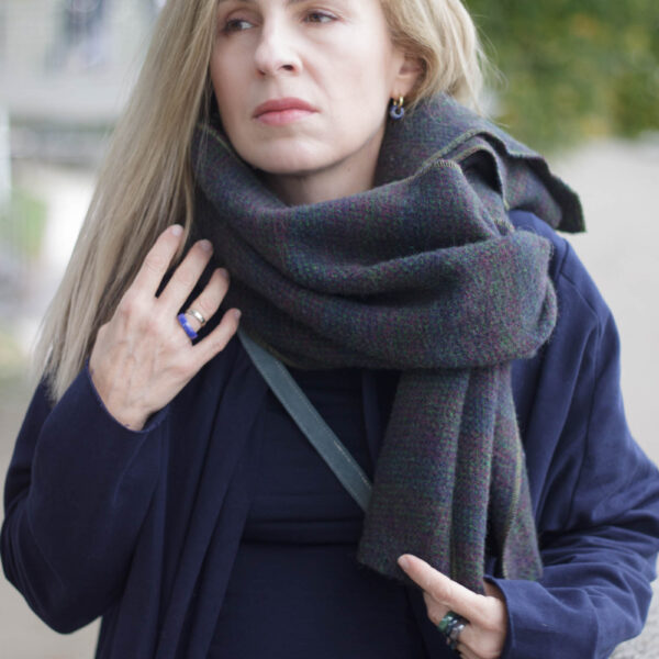 Charcoal scarf wrapped around the neck and shoulders, front view